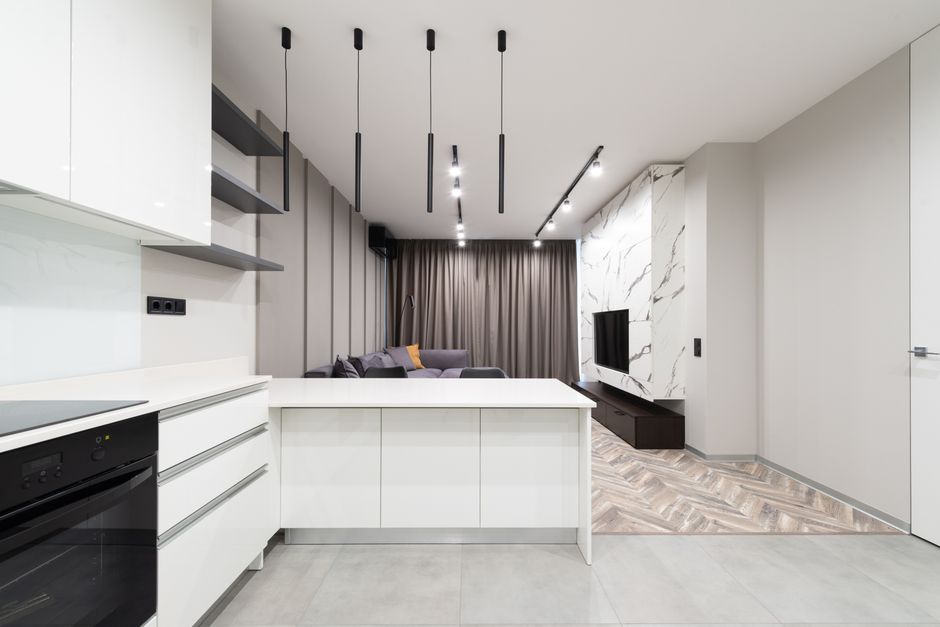 Bright and modern studio apartment with sleek furnishings and contemporary decor.